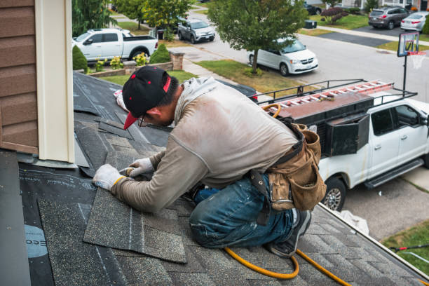 Professional Emergency Roof Repair technician working in Durham, OR